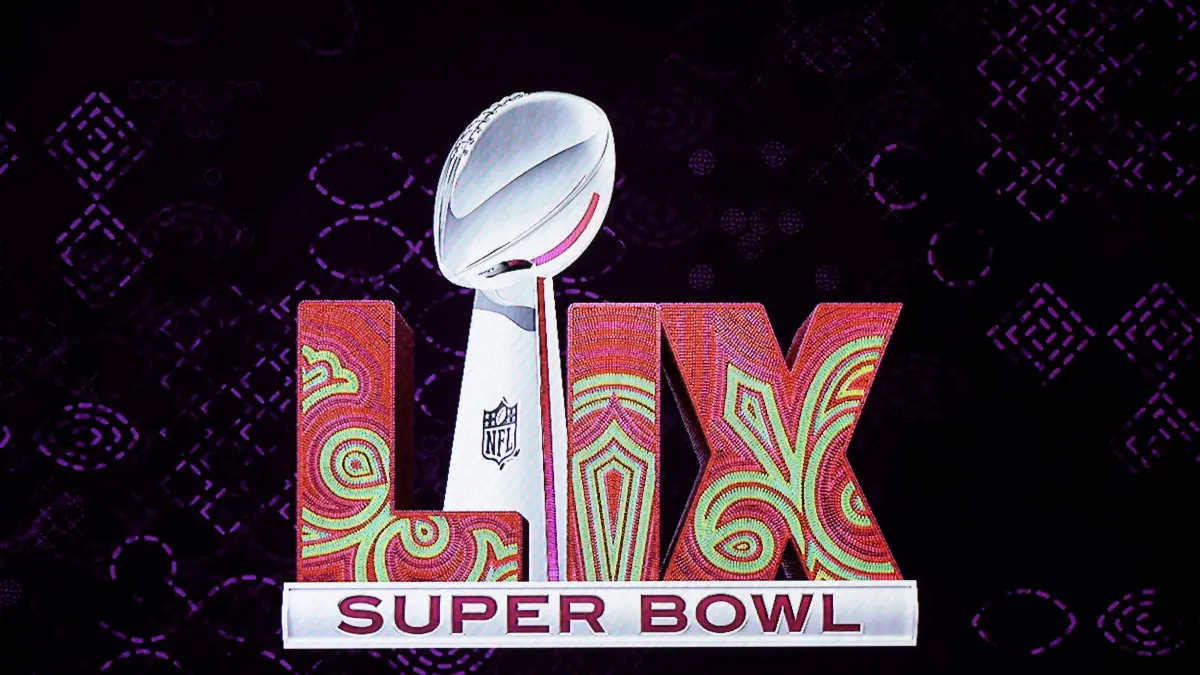 LAS VEGAS, NEVADA - FEBRUARY 12: The Logo for Super Bowl LIX in New Orleans is shown on a television screen during a Super Bowl Host Committee handoff news conference at the Mandalay Bay Convention Center on February 12, 2024 in Las Vegas, Nevada. Ethan Miller/Getty Images/AFP (Photo by Ethan Miller / GETTY IMAGES NORTH AMERICA / Getty Images via AFP)
