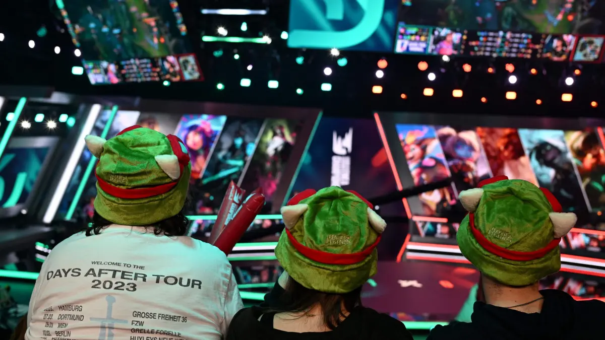 Spectators watch a competition between French e-sport club Team Vitality and SK Gaming as part of the League of Legends EMEA Championship at Riot Games Arena studio in Berlin-Adlershof, Germany on March 11, 2024. (Photo by Ralf Hirschberger / AFP)