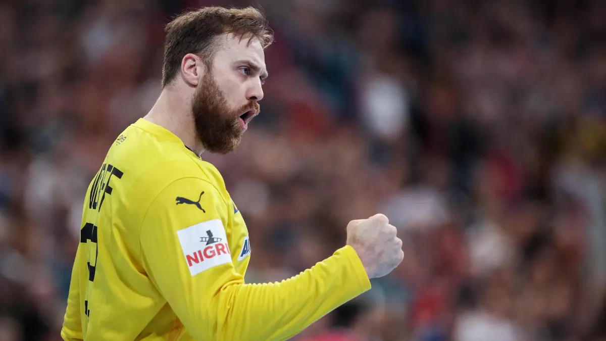 Germany's goalkeeper Andreas Wolff celebrates during the men's Handball Olympic qualifying match between Germany and Algeria in Hanover, western Germany on March 14, 2024. (Photo by Ronny Hartmann / AFP)