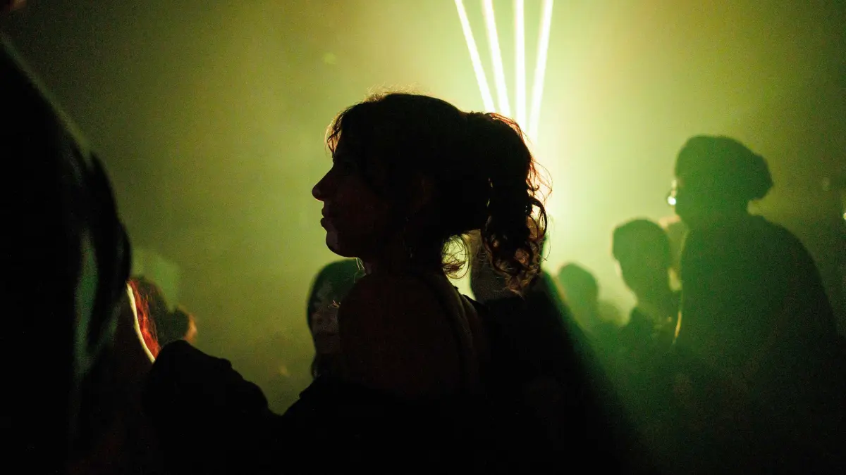 Club-goers dance at the Fuse nightclub in Brussels, on March 23, 2024. For 30 years, the Brussels nightclub Fuse has stood as a temple to Europe's legions of techno fans, a venue where the likes of Daft Punk and Aphex Twin set the concrete-walled dancefloor thumping. (Photo by Simon Wohlfahrt / AFP)