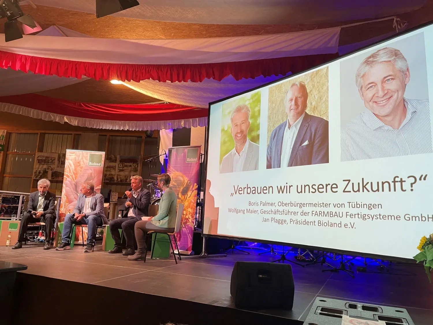 Podiumsdiskussion mit Tübingens Oberbürgermeister Boris Palmer, Farmbau-Chef Wolfgang Maier sowie Bioland-Präsident Jan Plagge.