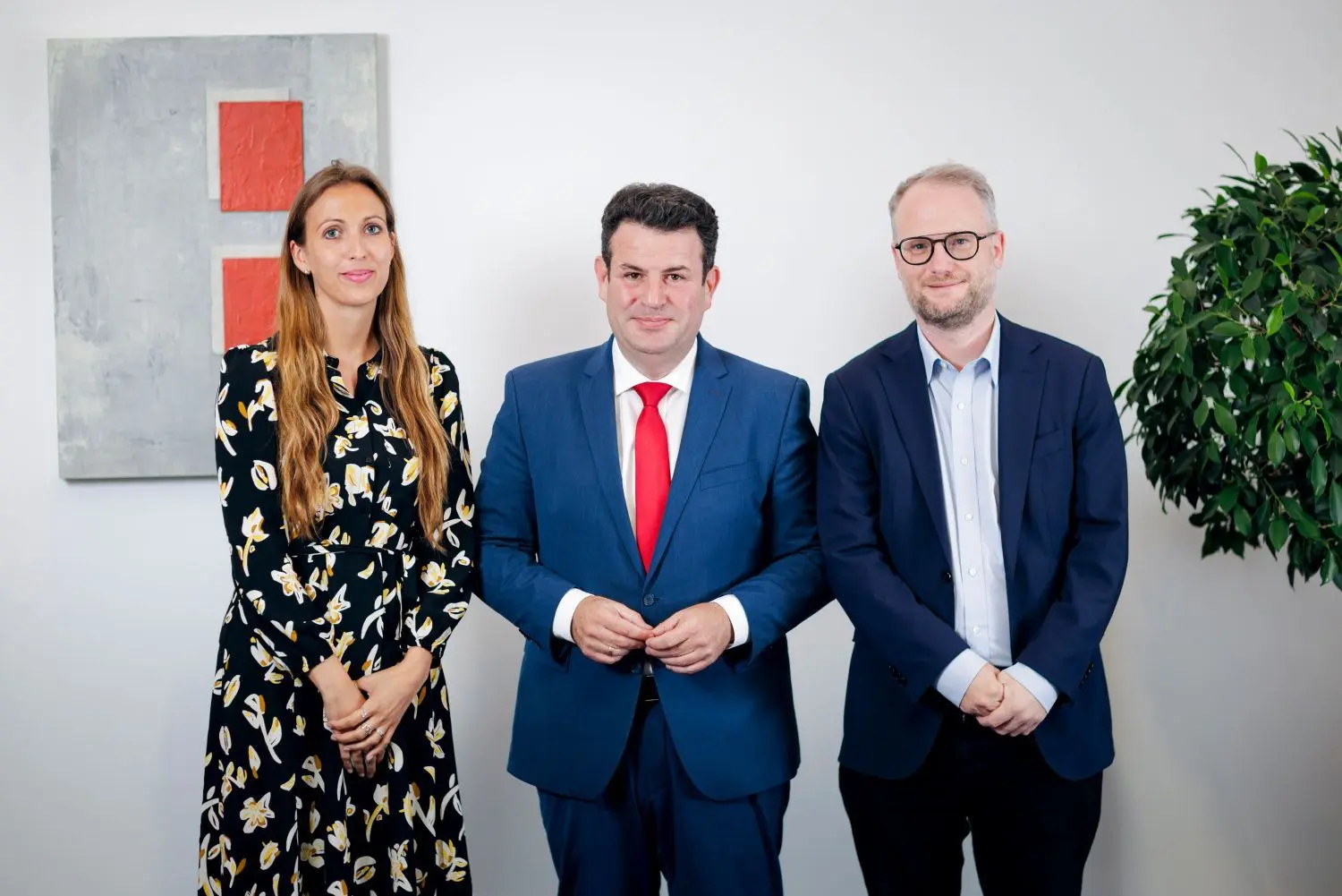 Jacky Westermann und Tobias Peter mit Arbeitsminister Hubertus Heil.