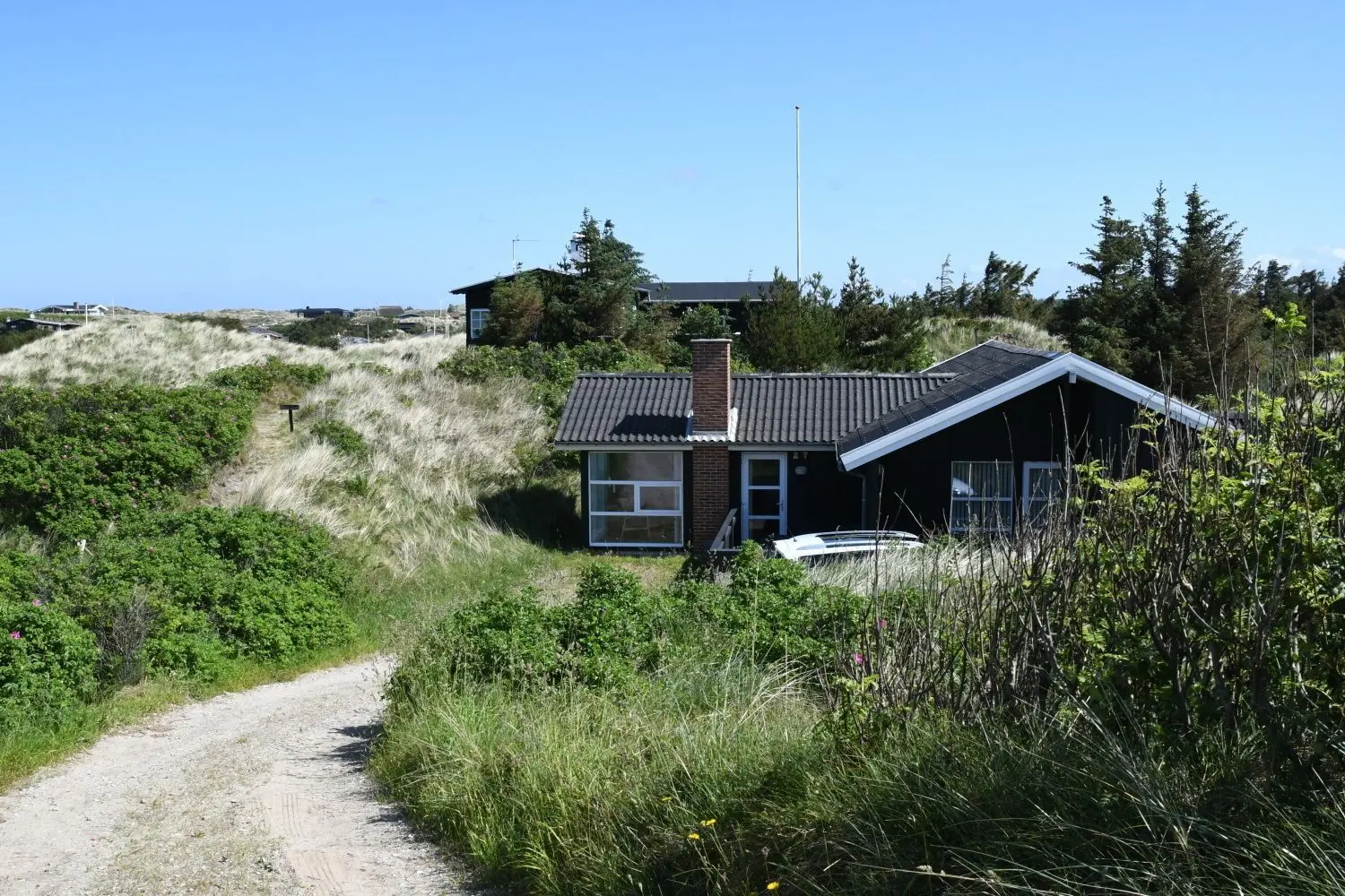 Ein Haus hinter der Düne und doch nicht weit weg vom Strand.