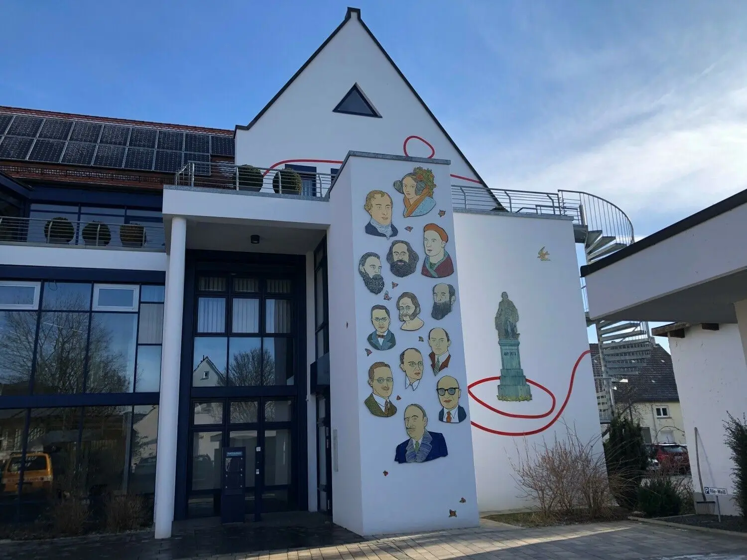 Bedeutende Köpfe der Wirtschaft am Eingang.