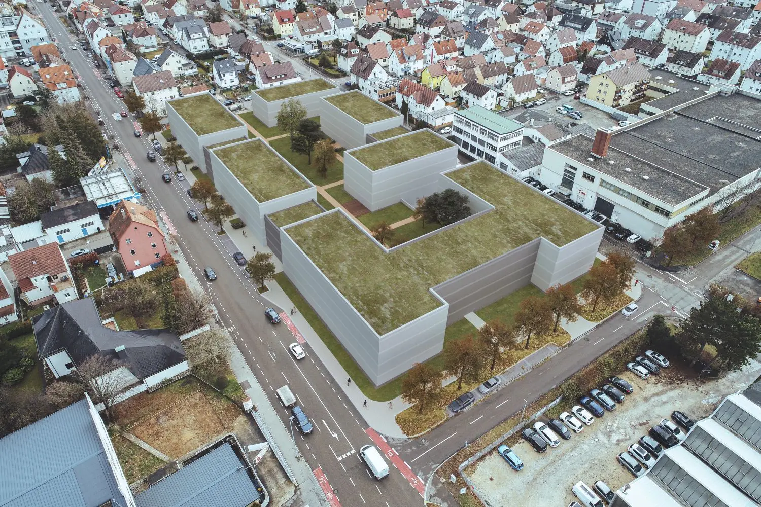 Die Bebauung soll gegen den Lärm der Stuttgarter Straße abschirmen. Die Planer versichern, dass die Gebäude nach der Detaillgestaltung weniger massiv als auf der Visualisierung wirken werden. Das Pflegeheim findet auf der Westseite (vorne) seinen Platz. ⇥