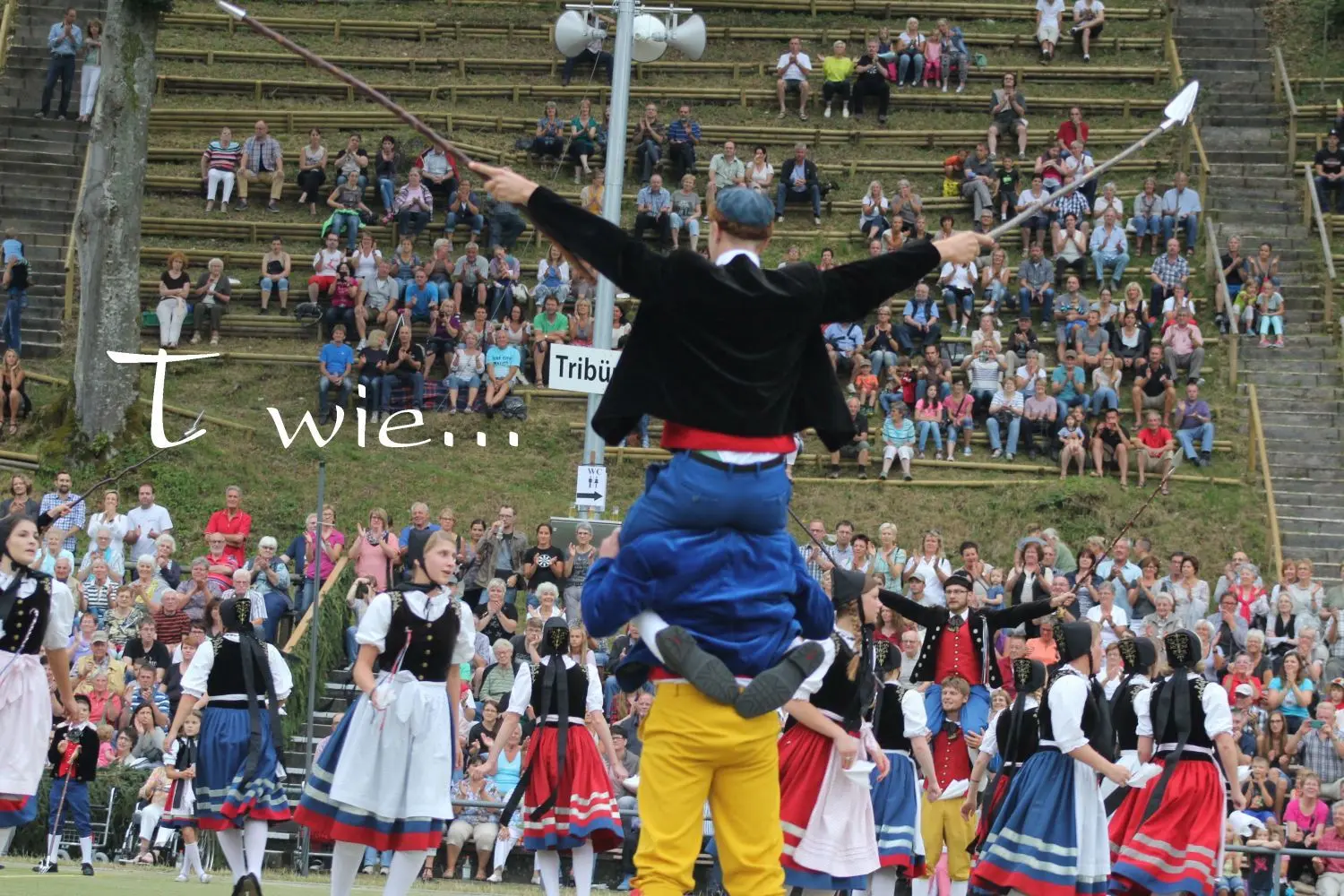 T wie... Tribüne