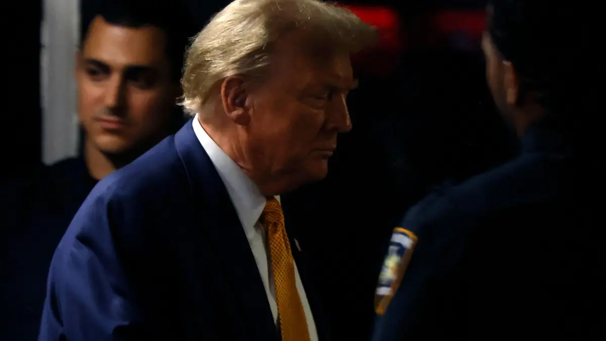 Former US President Donald Trump walks to the courtroom following a break in his trial for allegedly covering up hush money payments linked to extramarital affairs, at Manhattan Criminal Court in New York City, on May 14, 2024. Trump's former personal attorney Michael Cohen returns to the witness stand on Tuesday for what is expected to be a tough grilling by the ex-president's lawyers at his historic hush money trial. (Photo by Michael M. Santiago / POOL / AFP)