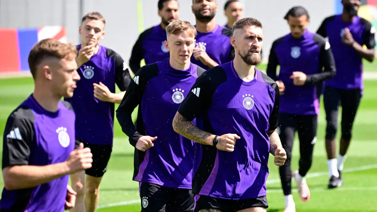 Germany's forward #14 Maximilian Beier (C) and teammates take part in a MD-1 training session in Herzogenaurach, Bavaria, on June 13, 2024, on the eve of their UEFA Euro 2024 football match against Scotland. (Photo by Tobias SCHWARZ / AFP)