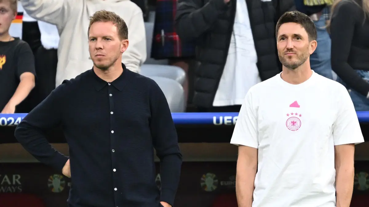 Euro2024: Deutschland — Schottland: 14.06.2024, Bayern, München: Fußball, UEFA Euro 2024, EM, Deutschland - Schottland, Vorrunde, Gruppe A, Spieltag 1, Fußball Arena München, Julian Nagelsmann (l) und Co-Trainer Benjamin Glück vor dem Spiel Foto: Sven Hoppe/dpa +++ dpa-Bildfunk +++