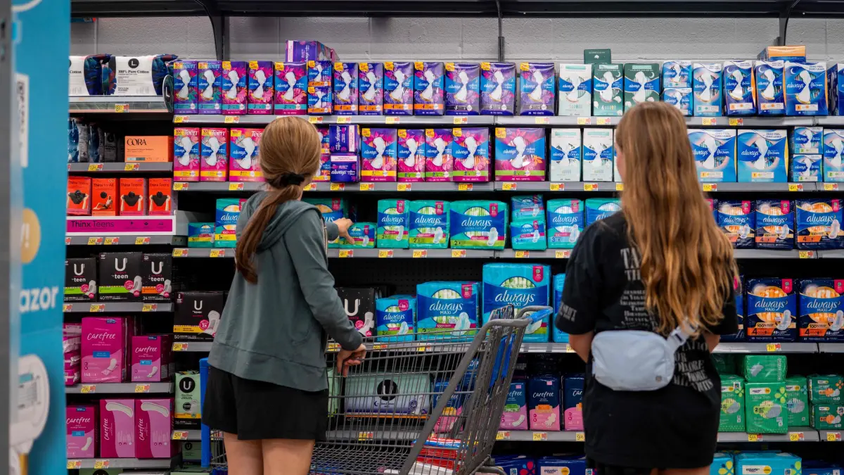 High Prices Of Feminine Hygiene Products Cause Drop In Sales: AUSTIN, TEXAS - JULY 22: A family shops for women's hygiene products at a Walmart Supercenter on July 22, 2024 in Austin, Texas. Annual U.S. unit sales of women's pads and tampons have declined 12% and 16% since 2020, according to data distributed from the consumer research firm NielsenIQ. Brandon Bell/Getty Images/AFP (Photo by Brandon Bell / GETTY IMAGES NORTH AMERICA / Getty Images via AFP)