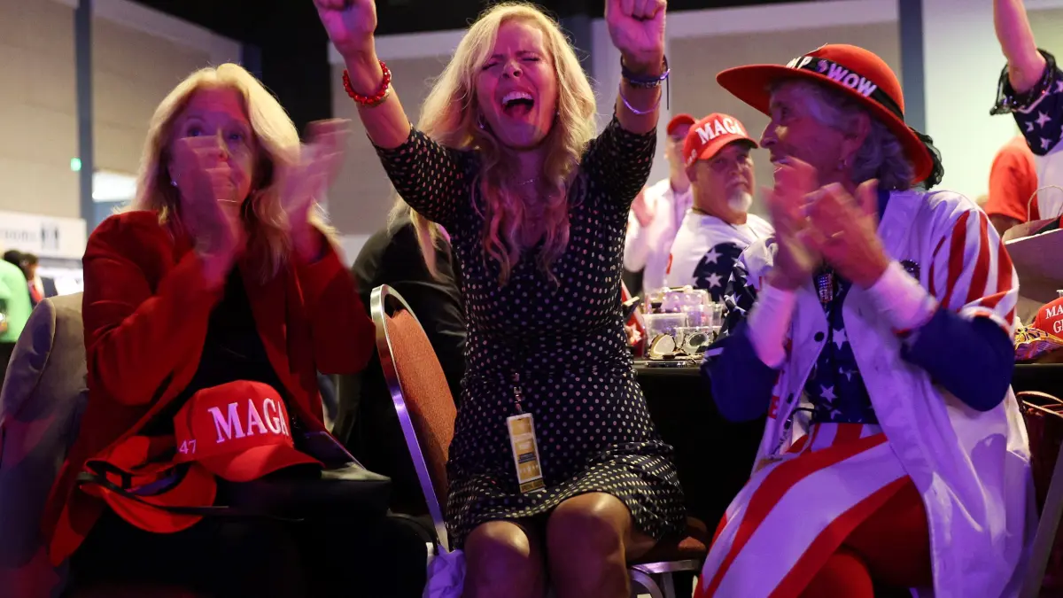 Republican Presidential Nominee Donald Trump Holds Election Night Event In West Palm Beach: WEST PALM BEACH, FLORIDA - NOVEMBER 05: Supporters react while watching returns come in during an election night watch party for Republican presidential nominee, former U.S. President Donald Trump at the Palm Beach Convention Center on November 05, 2024 in West Palm Beach, Florida. Americans cast their ballots today in the presidential race between Republican nominee former President Donald Trump and Vice President Kamala Harris, as well as multiple state elections that will determine the balance of power in Congress. John Moore/Getty Images/AFP (Photo by JOHN MOORE / GETTY IMAGES NORTH AMERICA / Getty Images via AFP)