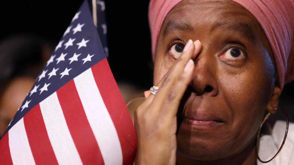 A supporter of US Vice President and Democratic presidential candidate Kamala Harris reacts during an election night event at Howard University in Washington, DC, on November 5, 2024. (Photo by CHARLY TRIBALLEAU / AFP)