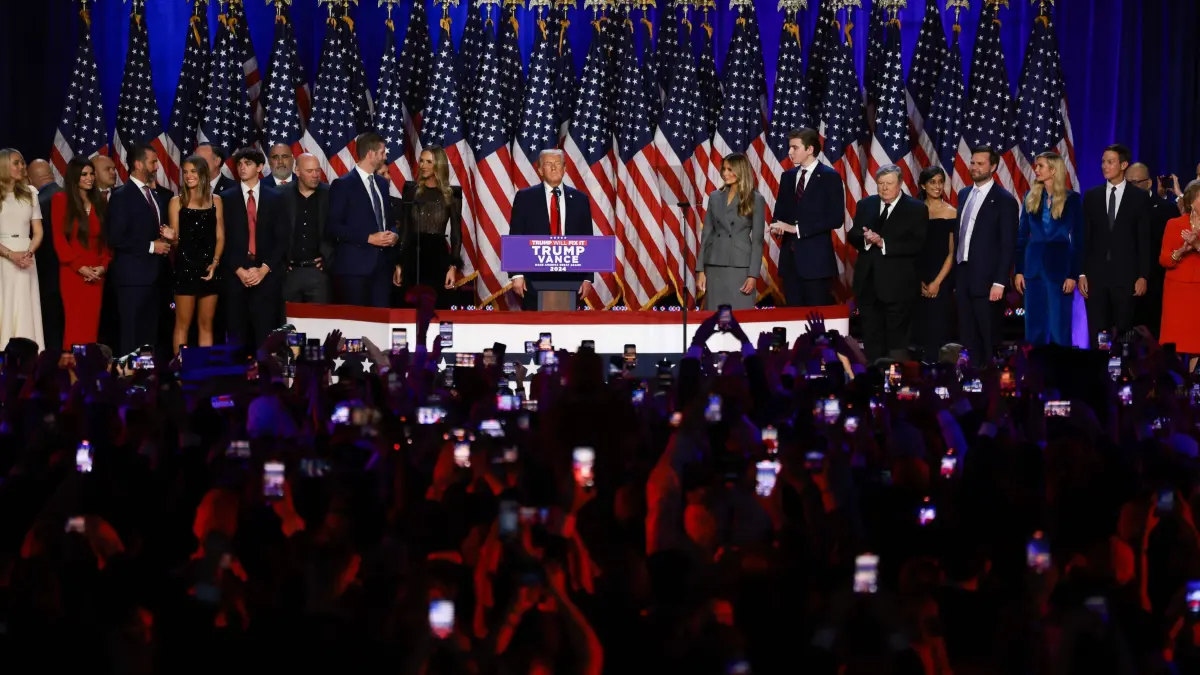 Republican Presidential Nominee Donald Trump Holds Election Night Event In West Palm Beach: WEST PALM BEACH, FLORIDA - NOVEMBER 06: Republican presidential nominee, former U.S. President Donald Trump arrives to speak as members of his family look on during an election night event at the Palm Beach Convention Center on November 06, 2024 in West Palm Beach, Florida. Americans cast their ballots today in the presidential race between Republican nominee former President Donald Trump and Vice President Kamala Harris, as well as multiple state elections that will determine the balance of power in Congress. Joe Raedle/Getty Images/AFP (Photo by JOE RAEDLE / GETTY IMAGES NORTH AMERICA / Getty Images via AFP)