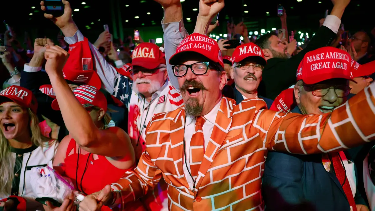 Republican Presidential Nominee Donald Trump Holds Election Night Event In West Palm Beach: WEST PALM BEACH, FLORIDA - NOVEMBER 06: Supporters react as Fox News projects Republican presidential nominee, former U.S. President Donald Trump is elected president during an election night event at the Palm Beach Convention Center on November 06, 2024 in West Palm Beach, Florida. Americans cast their ballots today in the presidential race between Republican nominee former President Donald Trump and Vice President Kamala Harris, as well as multiple state elections that will determine the balance of power in Congress. Chip Somodevilla/Getty Images/AFP (Photo by CHIP SOMODEVILLA / GETTY IMAGES NORTH AMERICA / Getty Images via AFP)