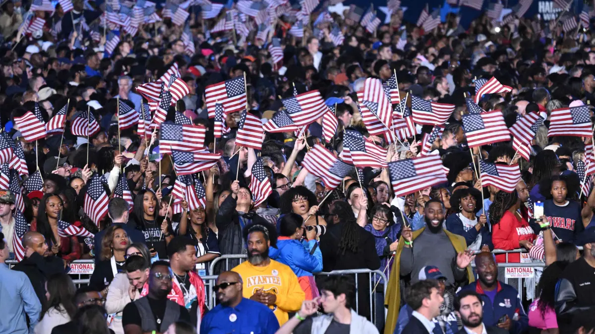 Supporters of US Vice President and Democratic presidential candidate Kamala Harris attend an election night event at Howard University in Washington, DC, on November 5, 2024. (Photo by SAUL LOEB / AFP)