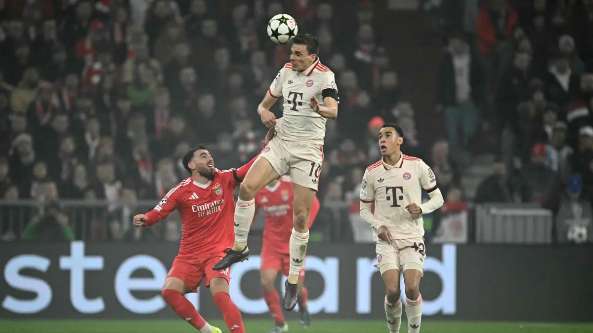 Football: UEFA Champions League - league phase day 4: Bayern Munich (GER) v Benfica (POR): (L-R) Benfica's Turkish midfielder #10 Orkun Kokcu, Bayern Munich's Portuguese midfielder #16 Joao Palhinha and Bayern Munich's German midfielder #42 Jamal Musiala vie for the ball during the UEFA Champions League football match FC Bayern Munich vs SL Benfica in Munich, southern Germany, on November 6, 2024. (Photo by Tobias SCHWARZ / AFP)