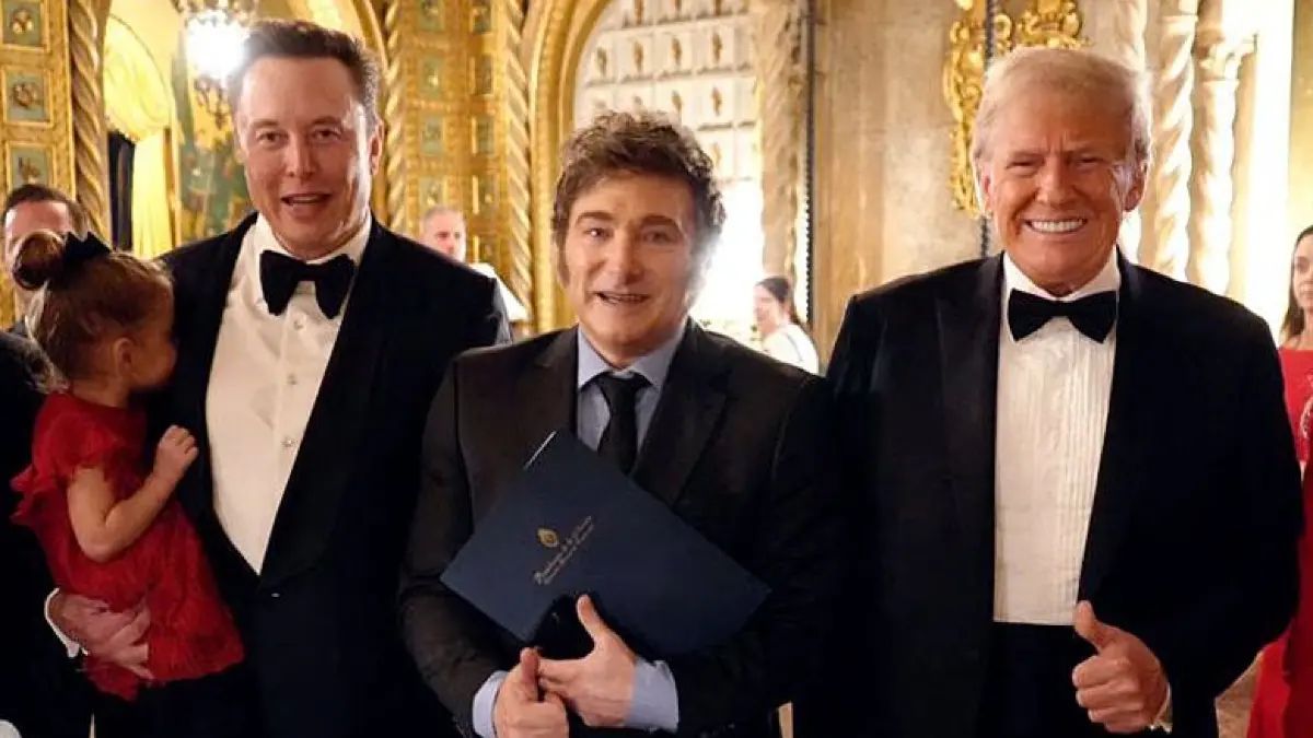 This handout picture released by the Argentinian Presidency shows (L-R) Argentine Foreign Minister Gerardo Werthein, Tesla and SpaceX CEO Elon Musk, Argentina's President Javier Milei, U.S. President-elect Donald Trump, and Argentina's Secretary General of the Presidency Karina Milei posing for a picture at Mar-a-Lago in Palm Beach, Florida, on November 14, 2024. (Photo by Handout / Argentinian Presidency / AFP) / RESTRICTED TO EDITORIAL USE - MANDATORY CREDIT "AFP PHOTO / HANDOUT / ARGENTINIAN PRESIDENCY" - NO MARKETING NO ADVERTISING CAMPAIGNS - DISTRIBUTED AS A SERVICE TO CLIENTS