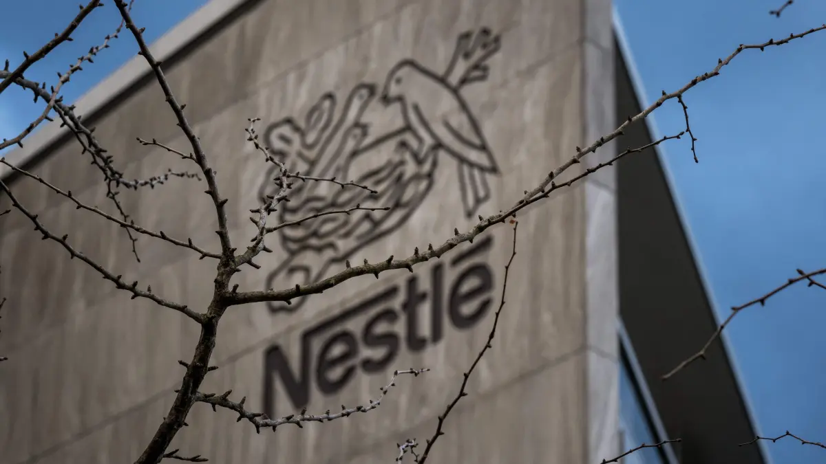 A picture taken on November 20, 2024 shows a sign of Swiss food giant Nestle on their headquarters in Vevey, western Switzerland. Nestle slid two percent on November 19, 2024, after new chief executive Laurent Freixe announced a plan to slash costs and have a standalone water and beverages business. (Photo by Fabrice COFFRINI / AFP)