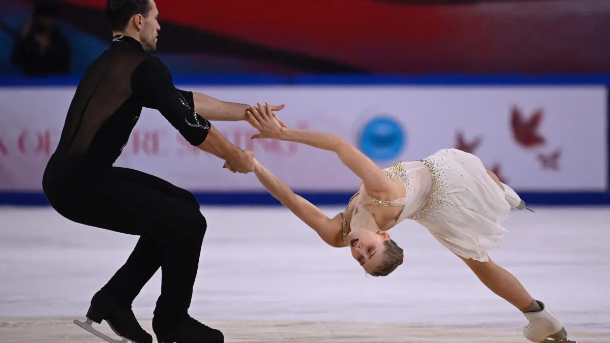 Germany's Minerva Fabienne Hase and Nikita Volodin compete in the pairs free skating event at the ISU figure skating Grand Prix Cup of China 2024 in Chongqing, Southwestern China on November 23, 2024. (Photo by WANG Zhao / AFP)