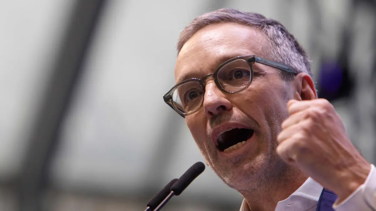 The chairman of Austria's far-right Freedom Party (FPOe) Herbert Kickl speaks during the New Year's meeting of the FPOe in Voesendorf near Vienna, Lower Austria on January 18, 2025. (Photo by Alex HALADA / AFP)