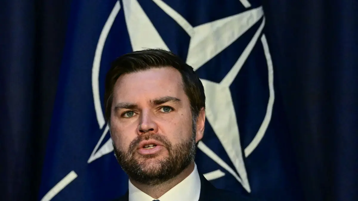 US Vice President JD Vance talks in front of the NATO logo as he meets with the NATO Secretary General (unseen) on the first day of the 61st Munich Security Conference (MSC) in Munich, southern Germany on February 14, 2025. (Photo by Tobias SCHWARZ / AFP)