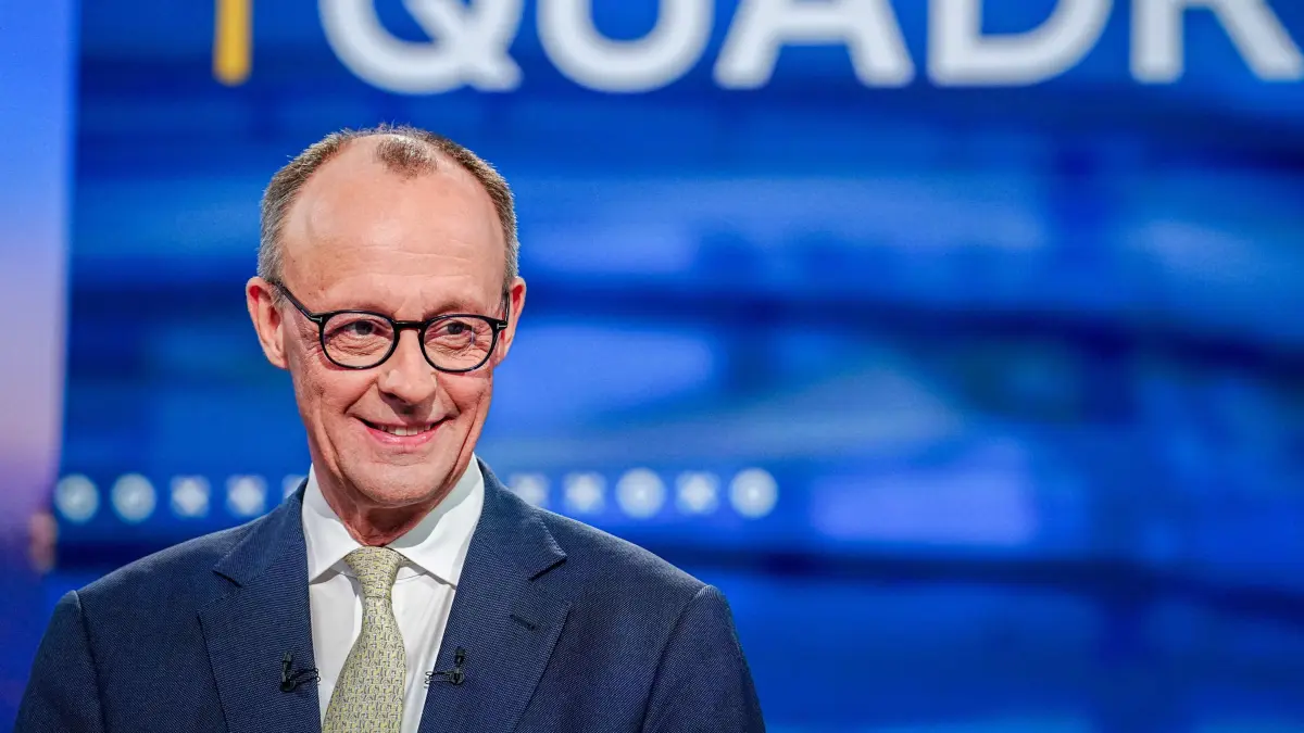 Friedrich Merz, main candidate and chairman of the Christian Democratic Union (CDU) reacts prior to a TV debate in Berlin on February 16, 2025, ahead of the parliamentary elections due to take place on February 23, 2025. (Photo by Kay Nietfeld / POOL / AFP)