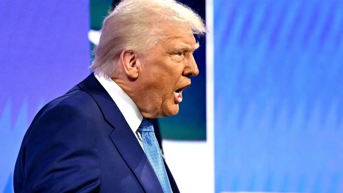 US President Donald Trump walks on stage to speak at FII PRIORITY Miami 2025 Summit (Future Investment Initiative) at the Faena Hotel & Forum in Miami Beach, Florida, February 19, 2025. (Photo by ROBERTO SCHMIDT / AFP)