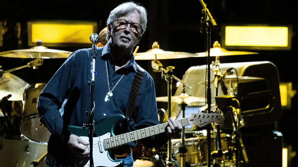 -: (FILES) English singer-songwriter and guitarist Eric Clapton performs on stage during a concert at the Stadthalle in Vienna, Austria, on June 6, 2019. Eric Clapton turns 80 on March 30, 2025. (Photo by GEORG HOCHMUTH / APA / AFP) / Austria OUT