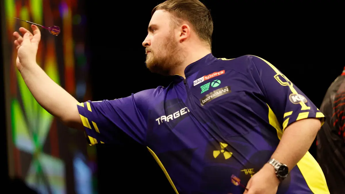 English' Luke Littler competes against English' Stephen Bunting during the eleventh round of Premier League Darts play at Ahoy Rotterdam, in Rotterdam, on April 17, 2025. (Photo by Bas Czerwinski / ANP / AFP) / Netherlands OUT