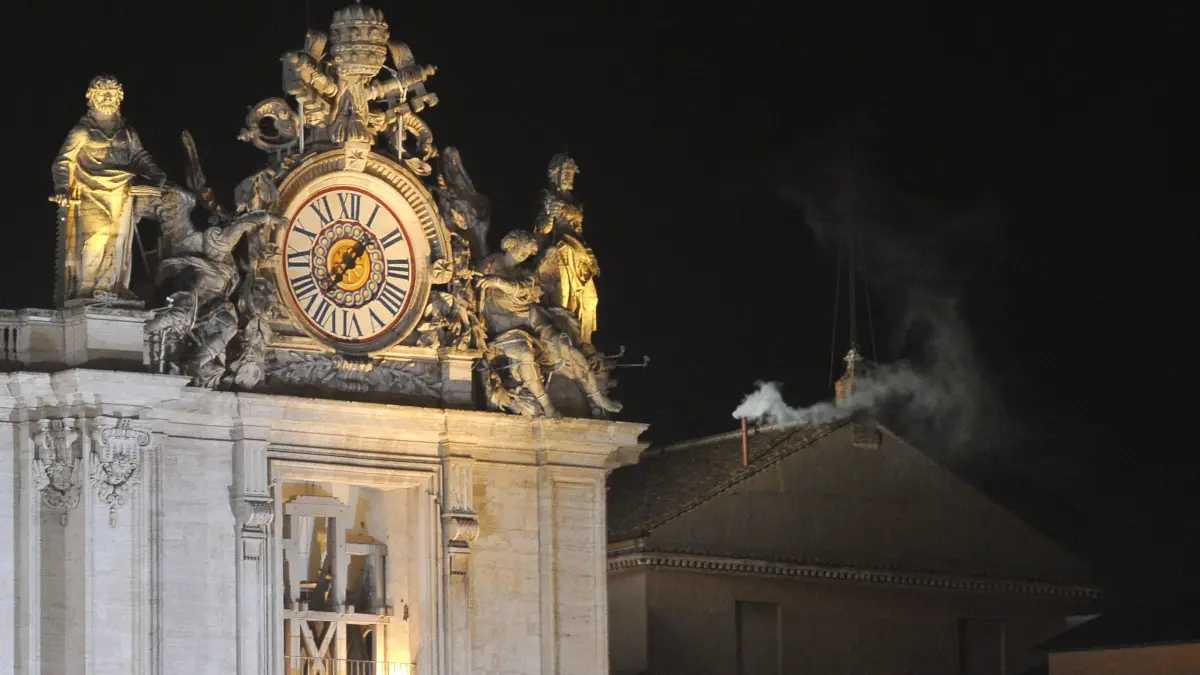 (FILES) White smoke rises from the chimney on the roof of the Sistine Chapel meaning that cardinals elected a new pope during the conclave on March 13, 2013 at the Vatican. Pope Francis died on April 21, 2025 aged 88, a day after making a much hoped-for appearance at Saint Peter's Square on Easter Sunday, the Vatican said in a statement. (Photo by Tiziana FABI / AFP)