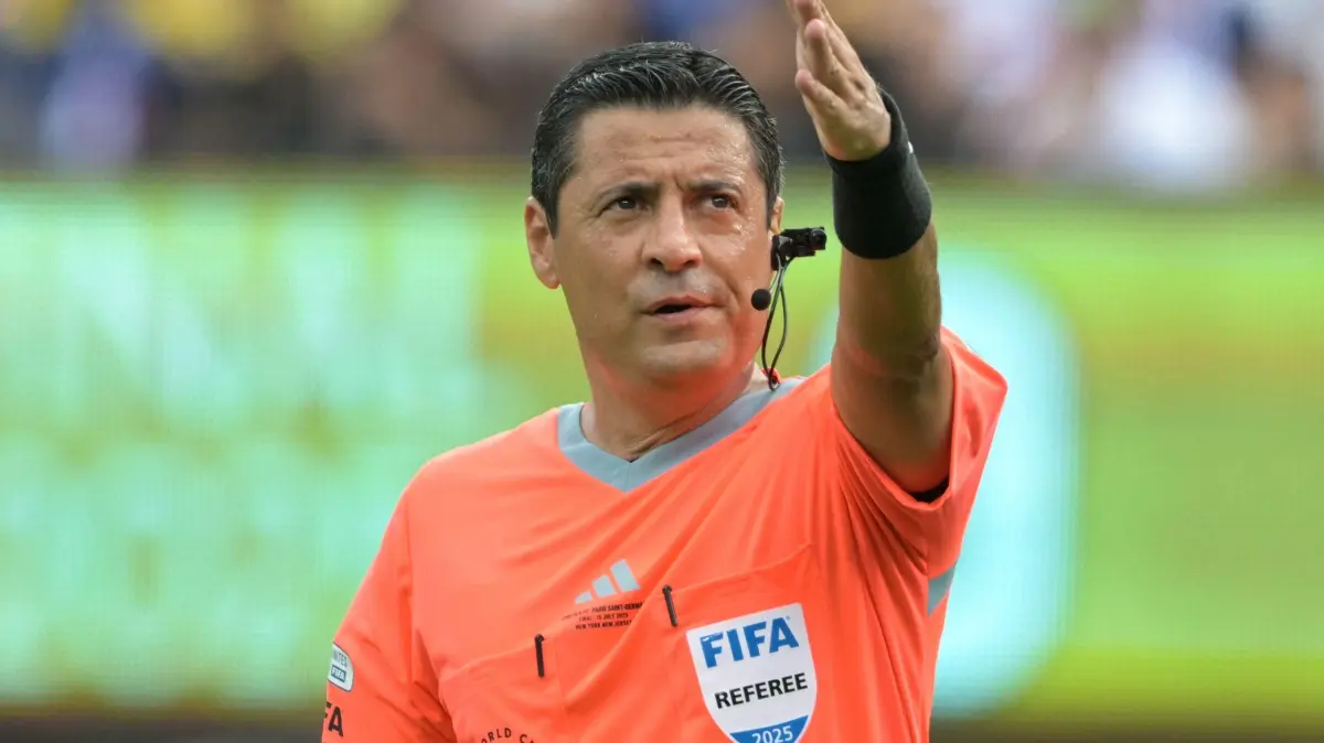 Australian-Iranian referee Alireza Faghani gestures during the FIFA Club World Cup 2025 final football match between England's Chelsea and France's Paris Saint-Germain at the MetLife Stadium in East Rutherford, New Jersey on July 13, 2025. (Photo by JUAN MABROMATA / AFP)