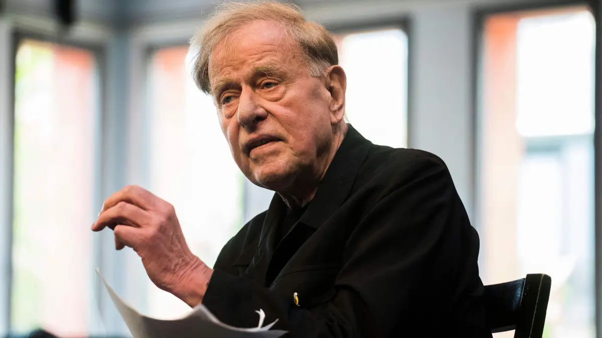 (FILES) German director Claus Peymann, then artistic director of the Berliner Ensemble theatre company, talks with the press in Berlin on May 3, 2017. German director Claus Peymann has died at the age of 88 in Berlin it was reported on July 16, 2025. (Photo by Odd ANDERSEN / AFP)