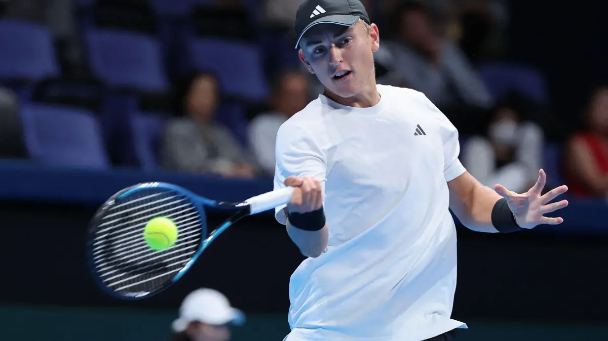 Germany's Justin Engel hits a return against Japan's Rei Sakamoto during their men's singles match at the Davis Cup tennis second round qualifier between Germany and Japan at Ariake Colosseum in Tokyo on September 13, 2025. (Photo by JIJI Press / AFP) / Japan OUT