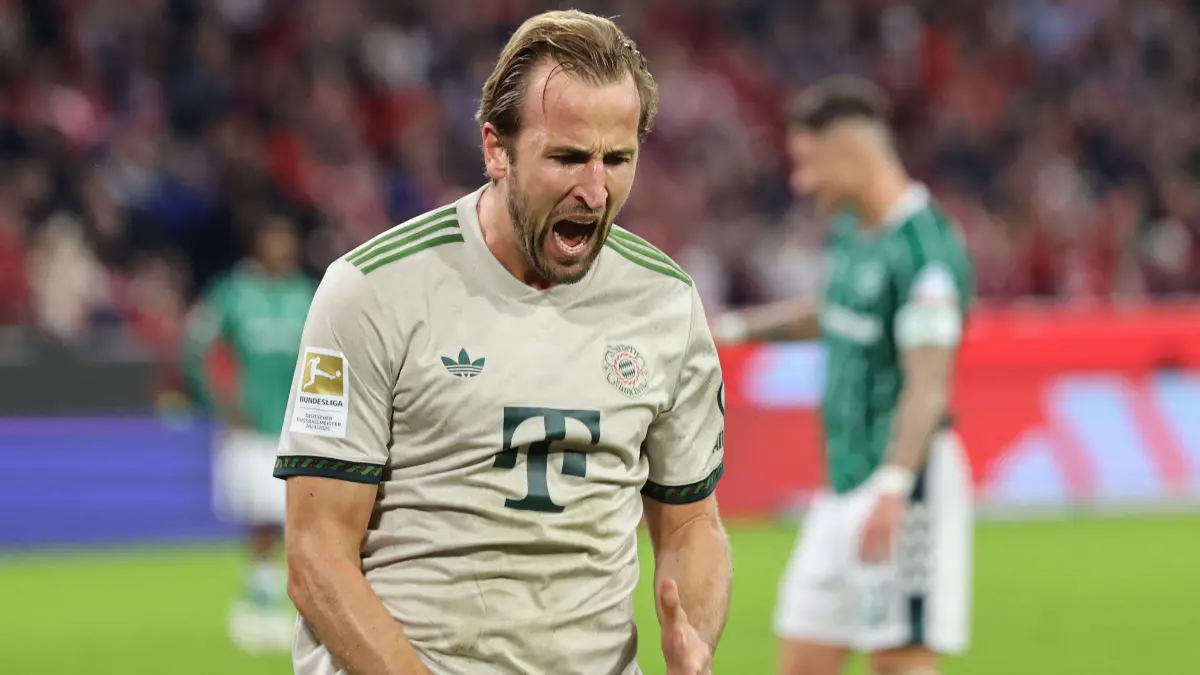 Bayern Munich's English forward #09 Harry Kane celebrates scoring a penalty during the German first division Bundesliga football match between Bayern Munich and Werder Bremen in Munich on Spetember 26, 2025. (Photo by Alexandra BEIER / AFP) / DFL REGULATIONS PROHIBIT ANY USE OF PHOTOGRAPHS AS IMAGE SEQUENCES AND/OR QUASI-VIDEO