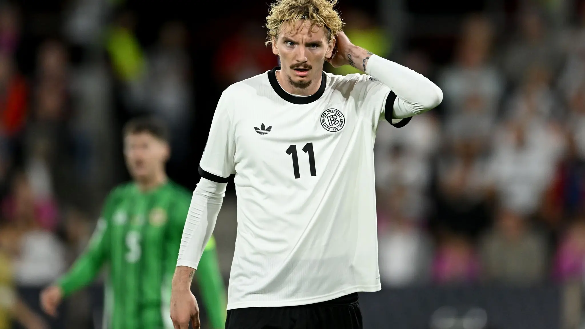 Deutschland - Nordirland: ARCHIV - 7. September 2025, Nordrhein-Westfalen, Köln: Fußball: WM-Qualifikation Europa, Deutschland - Nordirland, Gruppenphase, Gruppe A, 2. Spieltag, RheinEnergieStadion, Nick Woltemade (Deutschland) reagiert. (zu dpa: