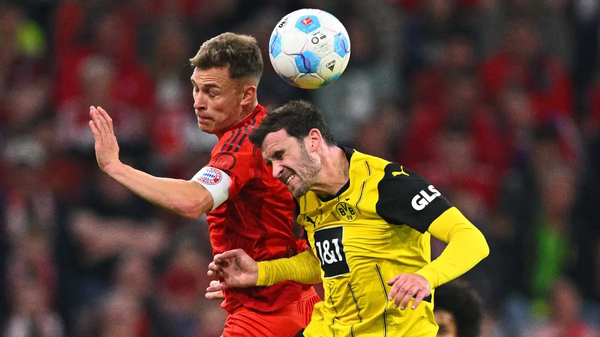 Bayern München - Borussia Dortmund: ARCHIV - 12.04.2025, Bayern, München: Fußball, Bundesliga, FC Bayern München - Borussia Dortmund, Spieltag 29, Allianz Arena, Münchens Joshua Kimmich (l) und Dortmunds Pascal Groß kämpfen um den Ball.
Joshua Kimmich fordert von seinem Team, Torchancen besser zu nutzen. (zu dpa: «Matthäus: BVB-Sieg in München wäre gut für Liga») Foto: Tom Weller/dpa +++ dpa-Bildfunk +++