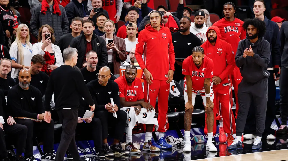 Chicago Bulls' French forward #24 Noa Essengue watches from the bench during the second half of an NBA game against the Detroit Pistons at the United Center in Chicago, Illinois, on October 22 2025. (Photo by KAMIL KRZACZYNSKI / AFP)