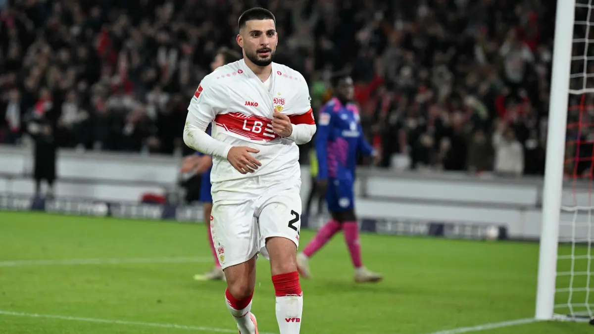 Stuttgart's German forward #26 Deniz Undav celebrates scoring the 2-1 goal during the German first division Bundesliga football match VfB Stuttgart v Mainz 05 in Stuttgart, southwestern Germany on October 26, 2025. (Photo by THOMAS KIENZLE / AFP) / DFL REGULATIONS PROHIBIT ANY USE OF PHOTOGRAPHS AS IMAGE SEQUENCES AND/OR QUASI-VIDEO