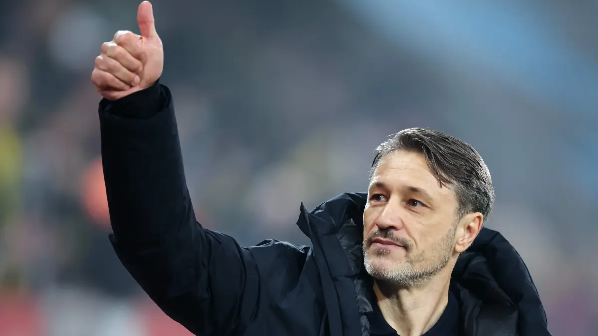 Dortmund's Croatian head coach Niko Kovac celebrates at the end of the German first division Bundesliga football match between FC Augsburg and Borussia Dortmund in Augsburg, southern Germany on October 31, 2025. Dortmund won the match 1-0. (Photo by Alexandra BEIER / AFP) / DFL REGULATIONS PROHIBIT ANY USE OF PHOTOGRAPHS AS IMAGE SEQUENCES AND/OR QUASI-VIDEO