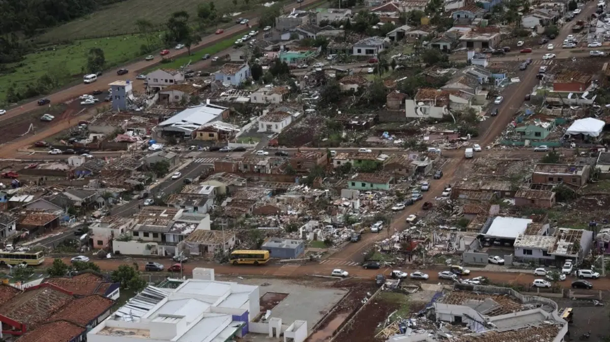 This aerial handout photo released by the Parana State Government shows the destruction after a tornado with winds of up to 250 kilometers per hour hit the city of Rio Bonito do Iguacu, in Brazil's Parana State on November 7, 2025. A tornado killed at least six people and injured more than 430 as it destroyed most of a town in southern Brazil, authorities said Saturday. (Photo by Handout / Parana State Government / AFP) / RESTRICTED TO EDITORIAL USE - MANDATORY CREDIT "AFP PHOTO / Parana State Government" - HANDOUT - NO MARKETING NO ADVERTISING CAMPAIGNS - DISTRIBUTED AS A SERVICE TO CLIENTS