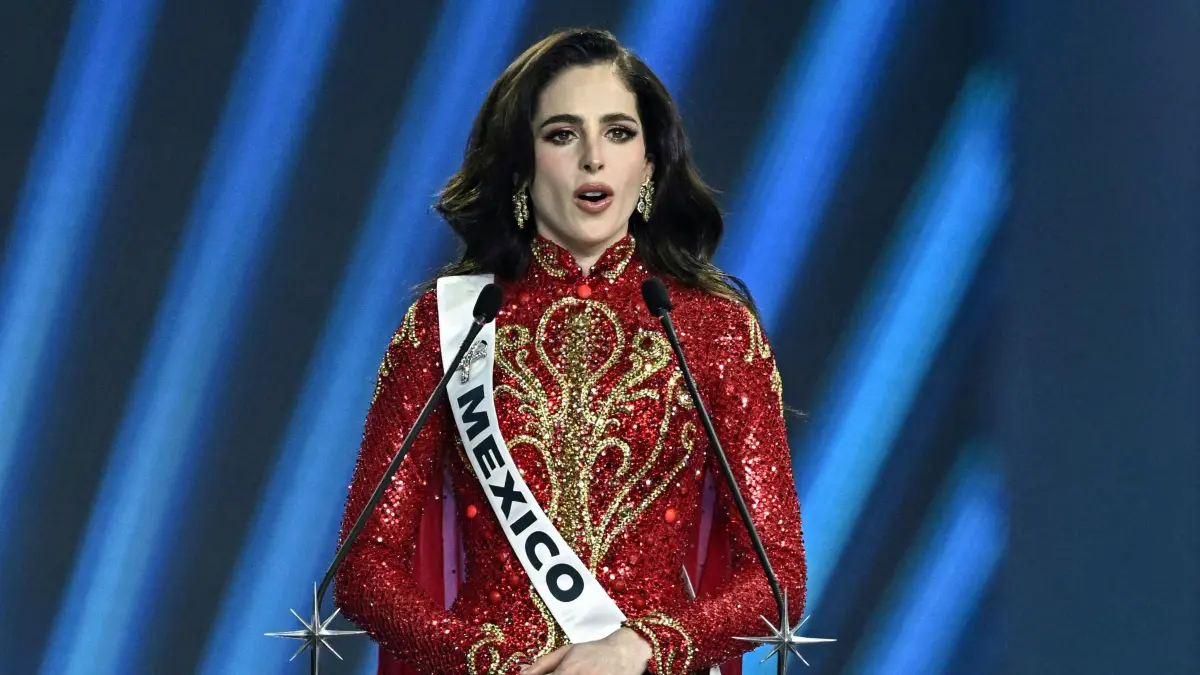 Miss Mexico Fatima Bosch talks on stage ahead of the winner being announced at the 2025 Miss Universe pageant in Nonthaburi, north of Bangkok, on November 21, 2025. (Photo by Lillian SUWANRUMPHA / AFP)