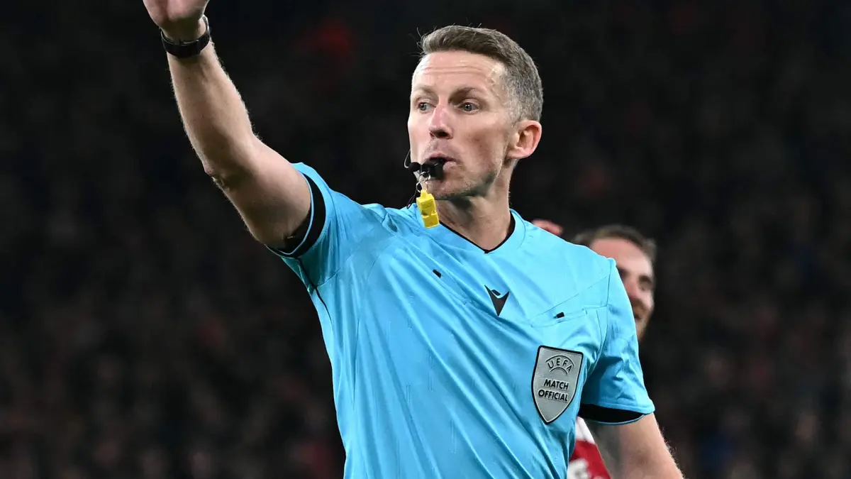 Referee Alejandro Hernandez Hernandez gestures during the UEFA Champions League league phase football match between Liverpool and PSV Eindhoven at Anfield in Liverpool, north west England on November 26, 2025. (Photo by Paul ELLIS / AFP)
