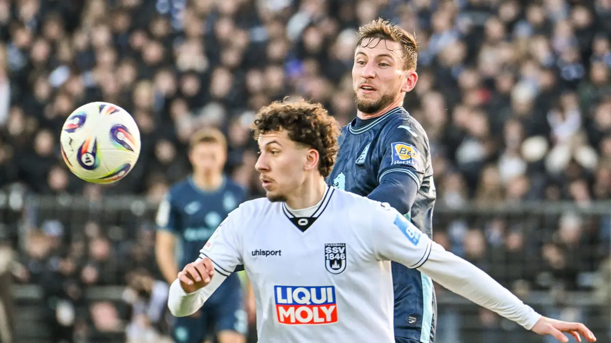 GER, 3. Liga, SSV Ulm 1846 vs TSV 1860 MŸnchen: GER, 3. Liga, SSV Ulm 1846 vs TSV 1860 München / 29.11.2025, Donaustadion, Ulm, GER, 3. Liga, SSV Ulm 1846 vs TSV 1860 München, im Bild Ensar Aksakal SSV Ulm, 7, Philipp Maier Muenchen, 26 *** GER, 3 Liga, SSV Ulm 1846 vs TSV 1860 Munich 29 11 2025, Donaustadion, Ulm, GER, 3 Liga, SSV Ulm 1846 vs TSV 1860 Munich, pictured Ensar Aksakal SSV Ulm, 7 , Philipp Maier Muenchen, 26 nordphotoxGmbHx/xHafner nph00200