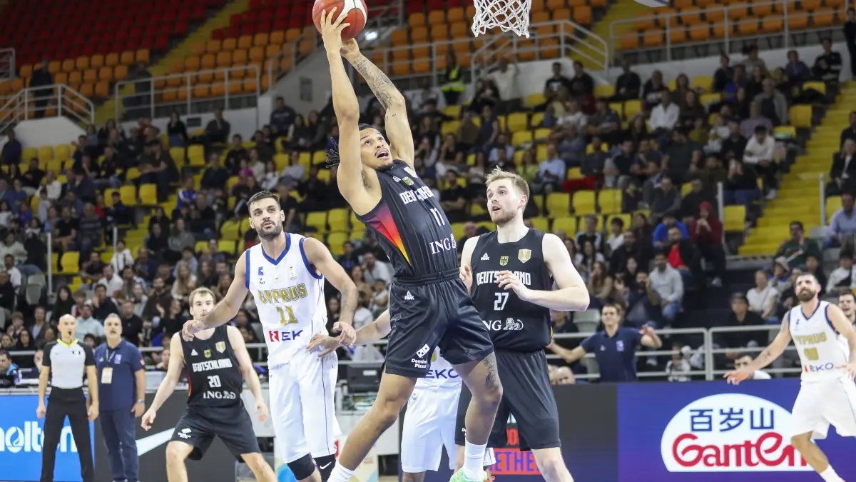 FIBA World Cup Qualifiers : Cyprus vs Germany: FIBA World Cup Qualifiers : Cyprus vs Germany NELSON WEIDEMANN of Germany takes a rebound. Cyprus plays vs Germany for the Group E of the FIBA Basketball World Cup European Qualifiers, at Spyros Kyprianou Arena, Limassol, Cyprus, on Dec. 1, 2025. Limassol Cyprus Copyright: xKOSTASxPIKOULASx