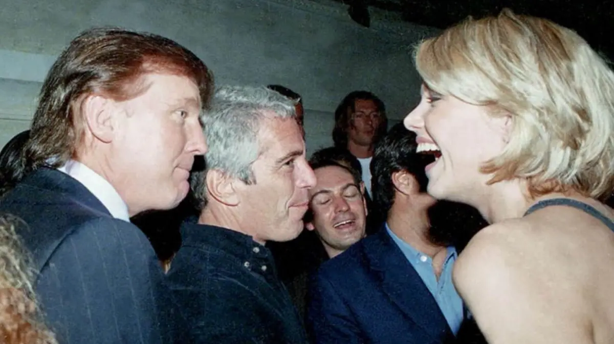This undated photo from the personal collection of Jeffrey Epstein provided by the Democrats on the House Oversight Committee on December 12, 2025, shows US President Donald Trump (L), flanked by Epstein (C), talking to an unknown woman. Democratic lawmakers released a new cache of photos on Friday from the estate of convicted sex offender Jeffrey Epstein that includes images of US President Donald Trump and former president Bill Clinton, as well as former Trump advisor Steve Bannon, former Clinton treasury secretary Larry Summers, director Woody Allen and the ex-prince now known as Andrew Mountbatten-Windsor. (Photo by HANDOUT / House Oversight Democrats / AFP) / RESTRICTED TO EDITORIAL USE - MANDATORY CREDIT "AFP PHOTO / HOUSE OVERSIGHT COMMITTEE DEMOCRATS / HANDOUT / " - NO MARKETING NO ADVERTISING CAMPAIGNS - DISTRIBUTED AS A SERVICE TO CLIENTS