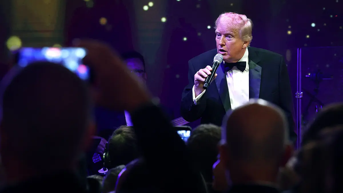 President Trump Hosts New Year's Eve Event At His Mar-A-Lago Club: PALM BEACH, FLORIDA - DECEMBER 31: U.S. President Donald Trump speaks to guests during a New Year’s Eve event at his Mar-a-Lago home on December 31, 2025 in Palm Beach, Florida. The President addressed guests and celebrated the arrival of 2026. Joe Raedle/Getty Images/AFP (Photo by JOE RAEDLE / GETTY IMAGES NORTH AMERICA / Getty Images via AFP)