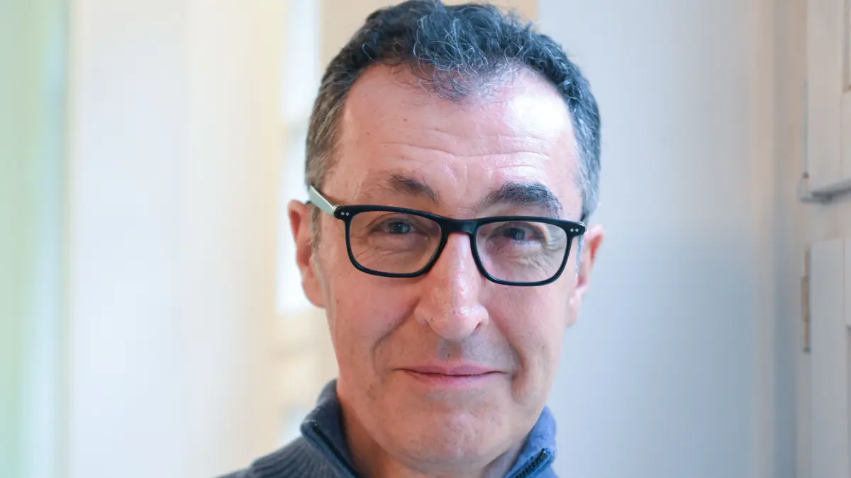 Cem Ozdemir, top candidate of the Greens for the upcoming state elections in the federal state Baden-Wuerttemberg, smiles during the presentation of the party’s electoral program in Stuttgart, southern Germany, on January 12, 2026. The state elections in Baden-Wuerttemberg take place on March 8, 2026. (Photo by THOMAS KIENZLE / AFP)
