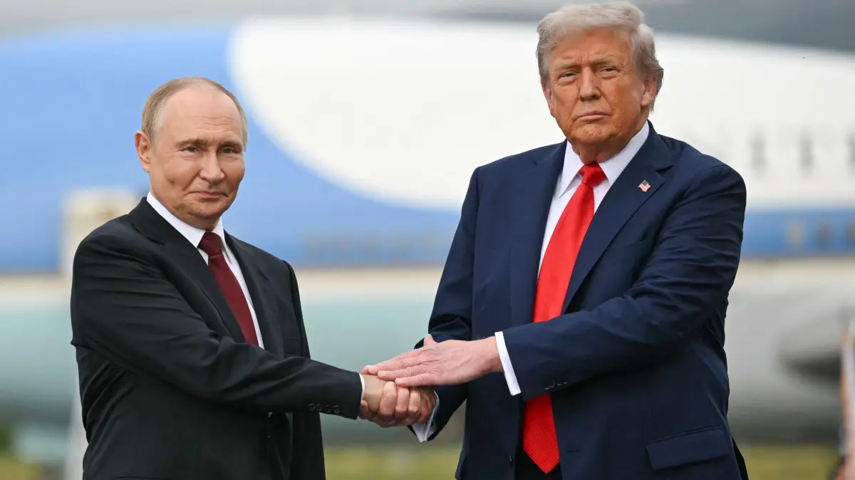 Mini package : One year of Trump presidency: (FILES) US President Donald Trump greets Russian President Vladimir Putin on the tarmac after they arrived at Joint Base Elmendorf-Richardson in Anchorage, Alaska, on August 15, 2025. One year into his second term, US President Donald Trump is shattering the post-World War II order as never before, leaving a world that may be unrecognizable once he is through. Far from slowing down, Trump has rung in the new year with a slew of aggressive actions that brazenly defy the decades-old order that was championed by the United States. (Photo by ANDREW CABALLERO-REYNOLDS / AFP)
