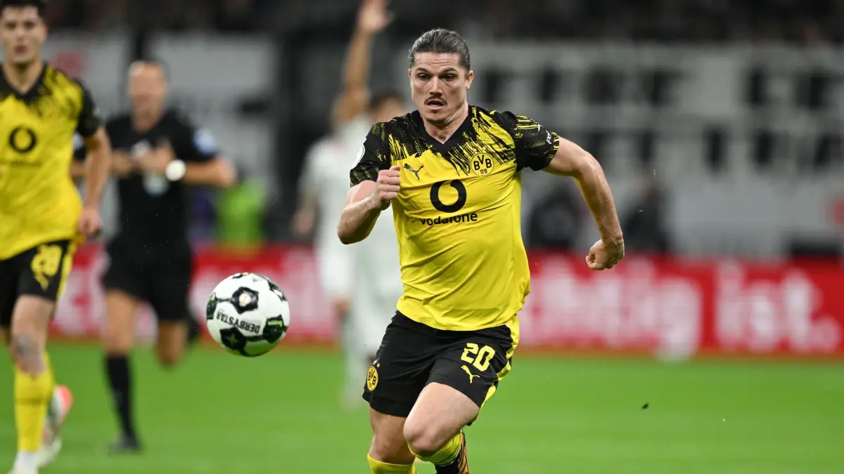 Marcel Sabitzer: ARCHIV - 28.10.2025, Hessen, Frankfurt/Main: Fußball: DFB-Pokal, Eintracht Frankfurt - Borussia Dortmund, 2. Runde, Deutsche Bank Park. Marcel Sabitzer (Borussia Dortmund) in Aktion. (zu dpa: «BVB hat «ein bisschen was gutzumachen» - Drei Spieler fehlen») Foto: Arne Dedert/dpa - WICHTIGER HINWEIS: Gemäß den Vorgaben der DFL Deutsche Fußball Liga bzw. des DFB Deutscher Fußball-Bund ist es untersagt, in dem Stadion und/oder vom Spiel angefertigte Fotoaufnahmen in Form von Sequenzbildern und/oder videoähnlichen Fotostrecken zu verwerten bzw. verwerten zu lassen. +++ dpa-Bildfunk +++