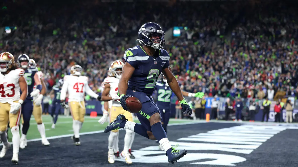 NFC Divisional Playoffs: San Francisco 49ers v Seattle Seahawks: SEATTLE, WASHINGTON - JANUARY 17: Kenneth Walker III #9 of the Seattle Seahawks scores a touchdown during the fourth quarter against the San Francisco 49ers in the NFC Divisional Playoff game at Lumen Field on January 17, 2026 in Seattle, Washington. Sean M. Haffey/Getty Images/AFP (Photo by Sean M. Haffey / GETTY IMAGES NORTH AMERICA / Getty Images via AFP)